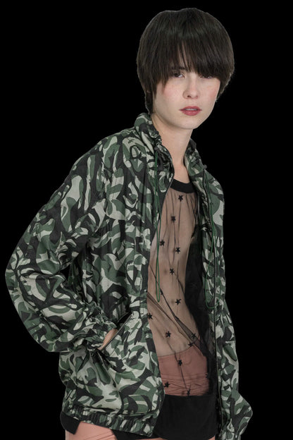 Jaqueta camuflada detalhe Garimpo Adda